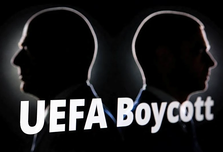 Soccer-Reaction to UEFA vote to boycott World Cup over FIFA stake sale plans