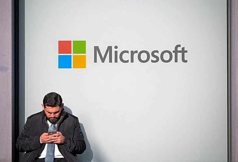 Microsoft sets record with near $450 billion single-day gain in market value
