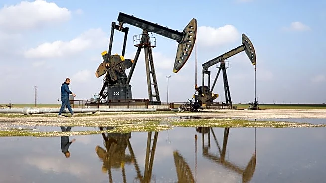 Oil falls on slightly improved flows through Gulf; set for monthly gain