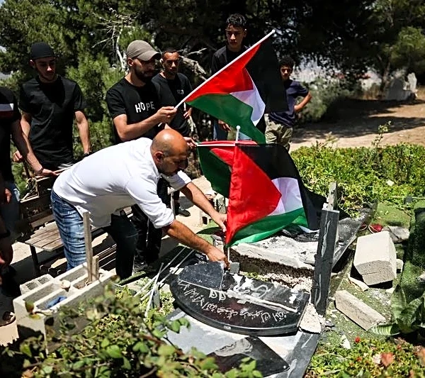 Israeli military cracks down on West Bank village as settlers march in