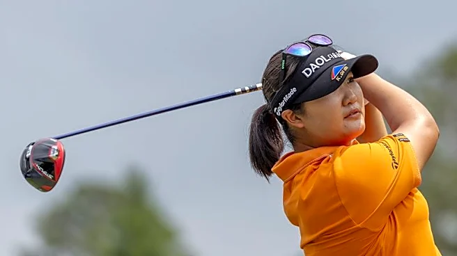 Golf-Ryu recovers from bad second-round start to take halfway lead at Women's Open