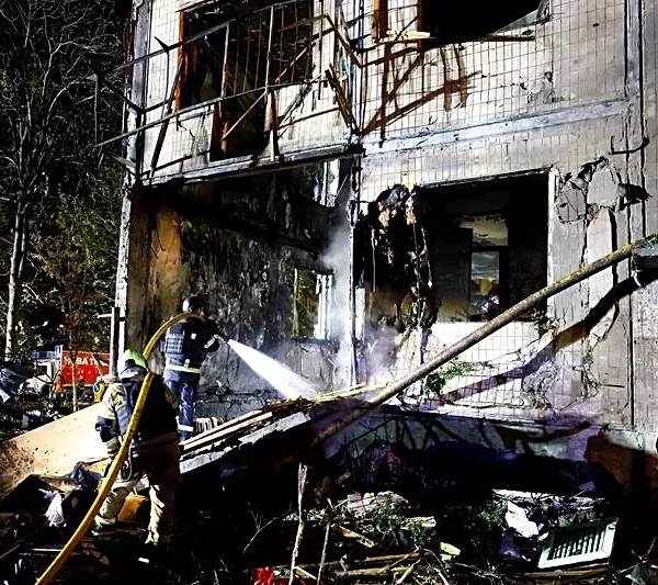 Russia pounds Kyiv with missiles, killing at least nine