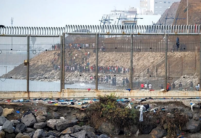 Spain installs floating barrier in Ceuta after calm night following border rush