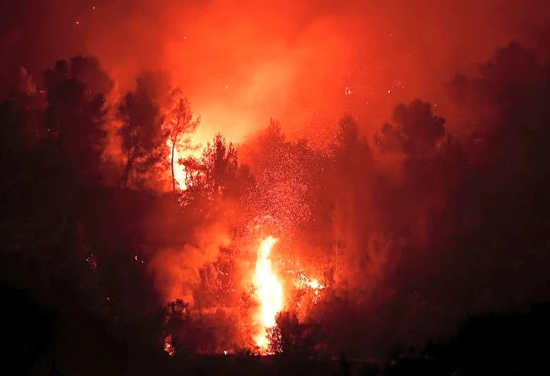 Wildfires rage in Greece as firefighters continue battle in France and Spain