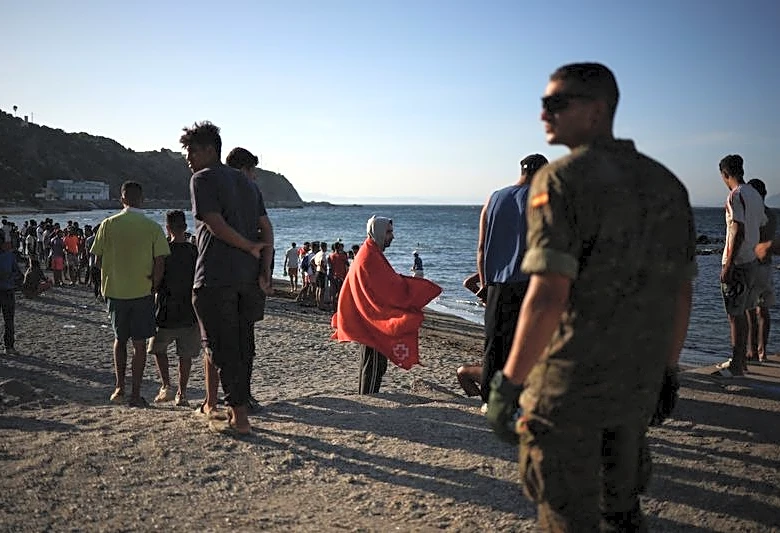 Spain's Ceuta overwhelmed as thousands remain after migrant border rush