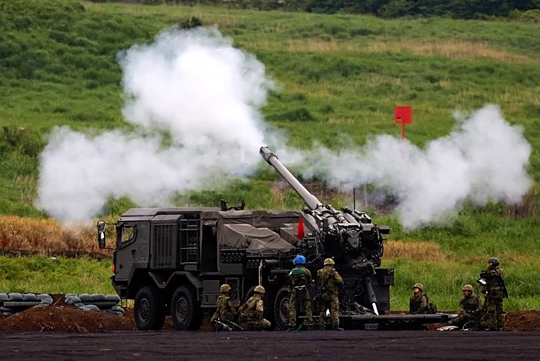 Japan casts military buildup as path to economic prosperity