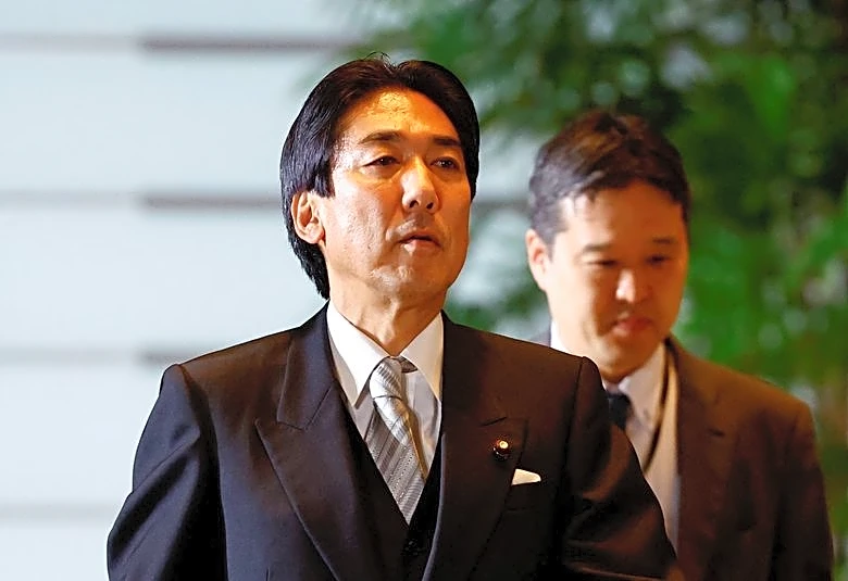 Japan's economy minister offers sanguine view on inflation