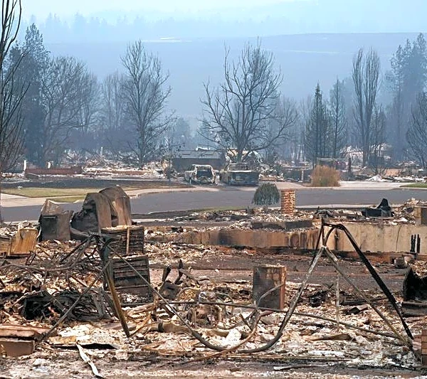 Arson suspect arrested as wildfires rage around Spokane, Washington