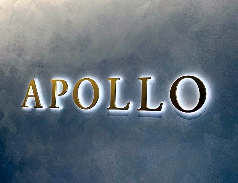 Apollo debt deal fees and insurance earnings rise, asset sales drag