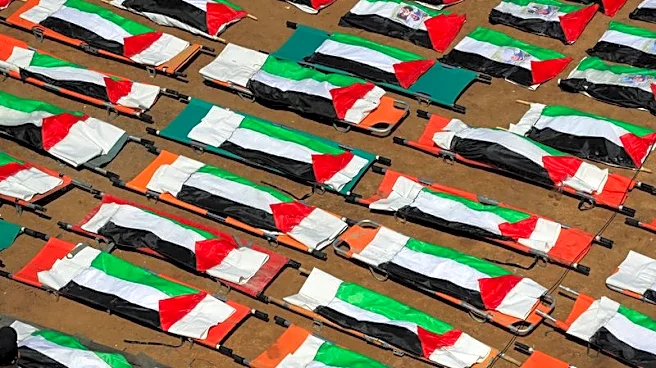 Gazans bury nearly a whole clan found in rubble in mass funeral for 112