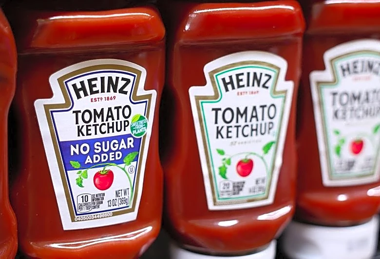Kraft Heinz raises forecasts, but turnaround efforts struggle to excite investors