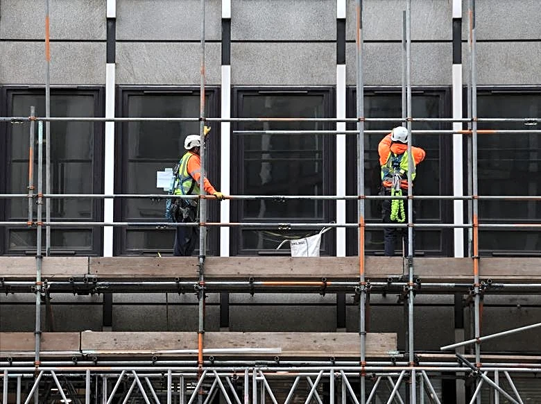 Slump for UK builders abates in July, PMI shows