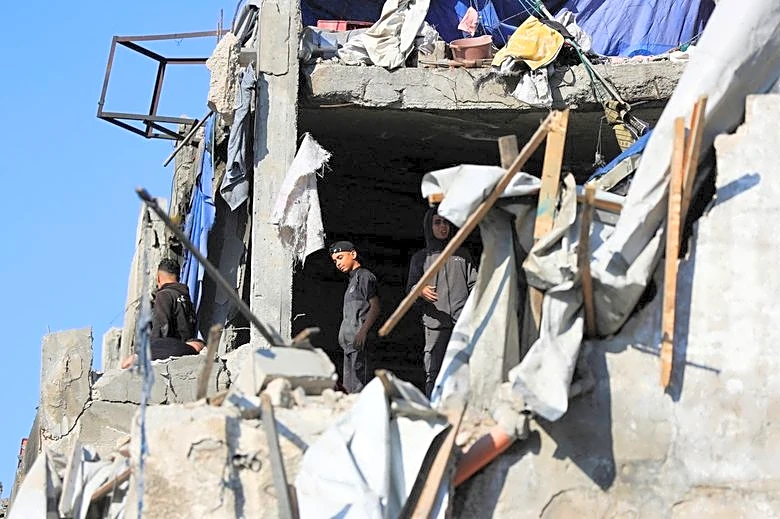 Explainer-Trump's Gaza plan hinges on Hamas disarmament, Israeli withdrawals