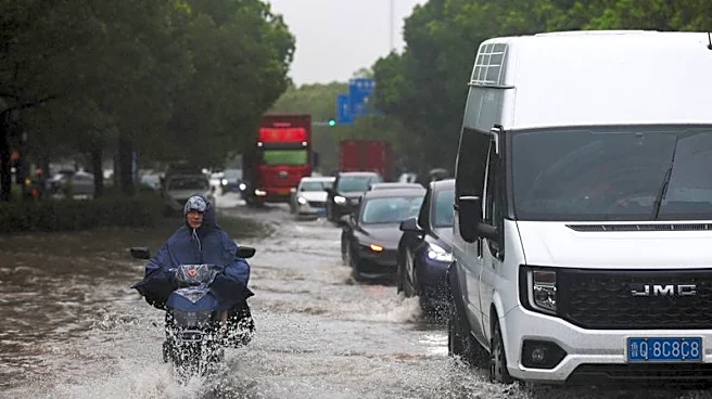Typhoon Dolphin floods central China, puts Beijing on alert for heavy rain