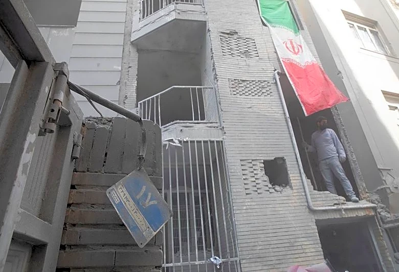 Iranian photojournalist faces 15 years in prison over images, reporting