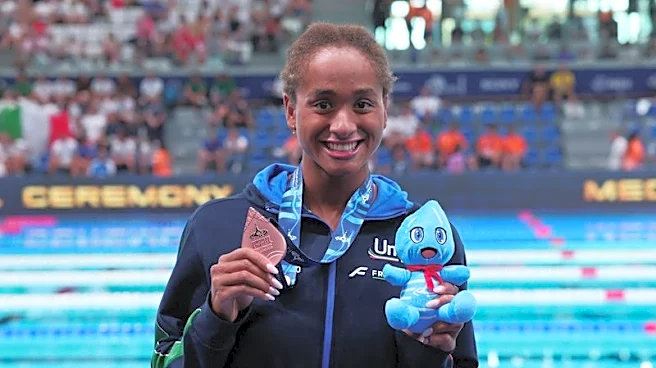 Swimming-Italy's Curtis takes McKeown's 50m backstroke world record