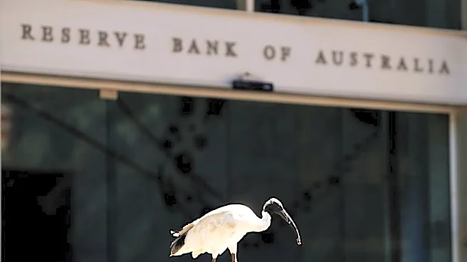 Australia central banker says rate hikes working as intended