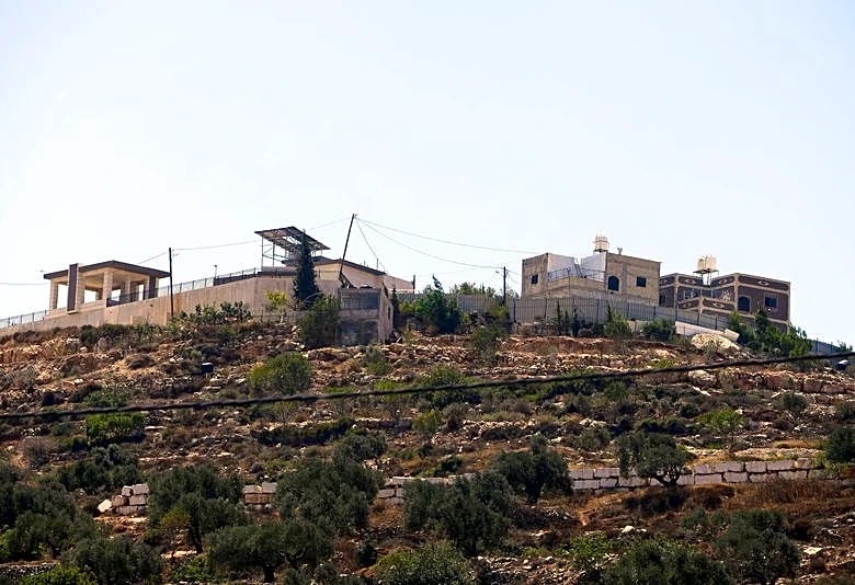Israel sends troops into West Bank homes besieged by Jewish settlers