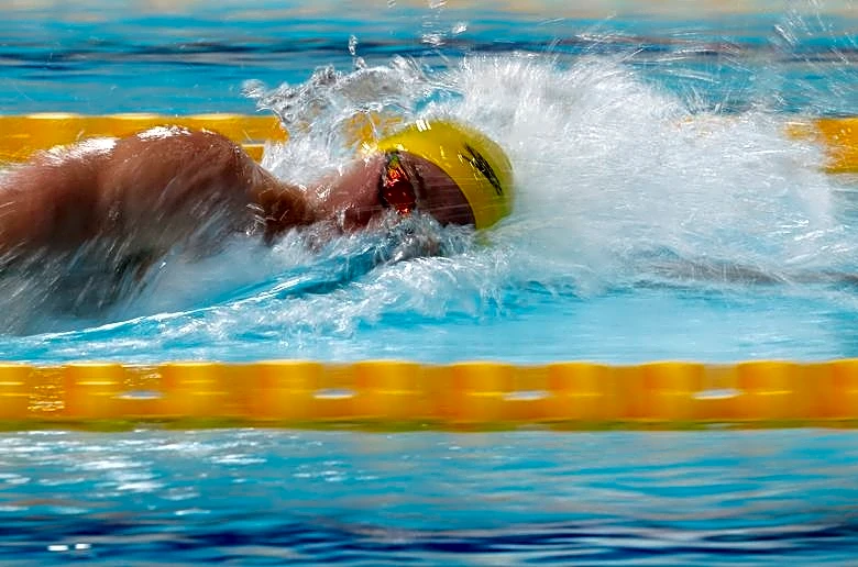 Swimming-Short breaks Thorpe record as Australia sweeps 400m freestyle golds at Pan Pacific