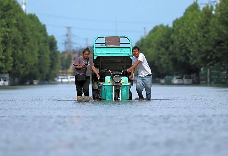 Xi calls for improving disaster prevention as floods, landslides batter China