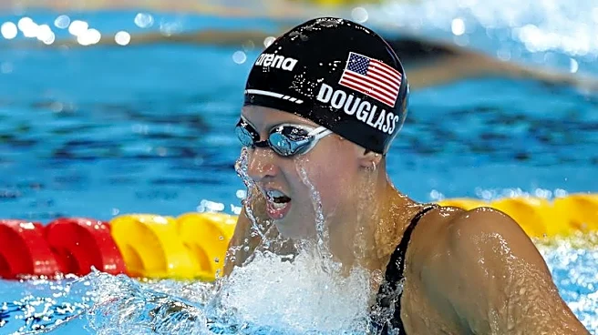 Swimming-Douglass sets 50m freestyle world record twice in one day