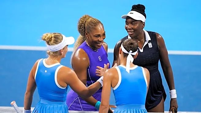 Tennis-Williams sisters beaten on doubles return at Cincinnati Open
