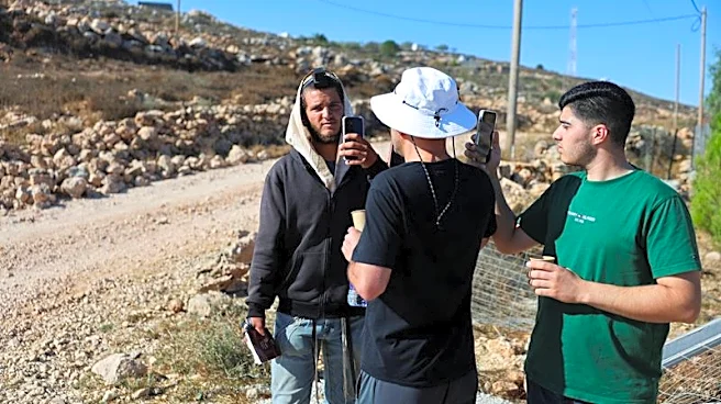 Exclusive-Israeli settler confronts Palestinian American at his besieged West Bank home