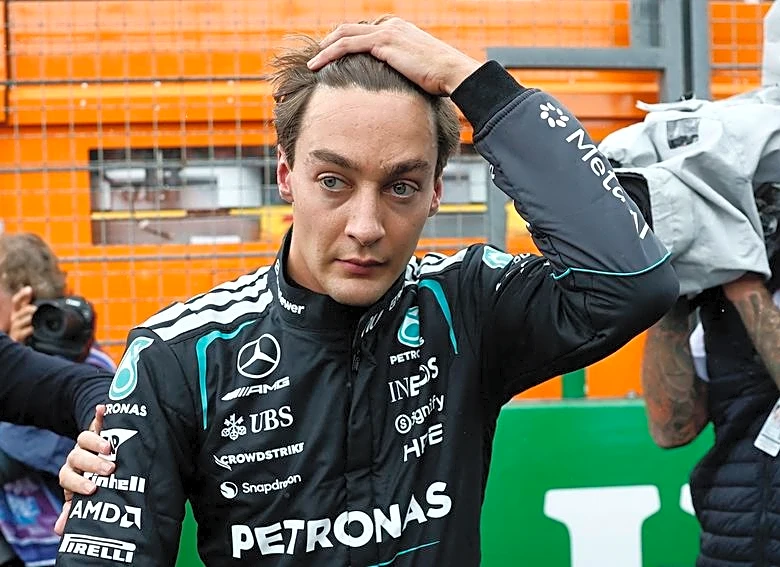 Motor racing-Russell defends Mercedes team orders against himself