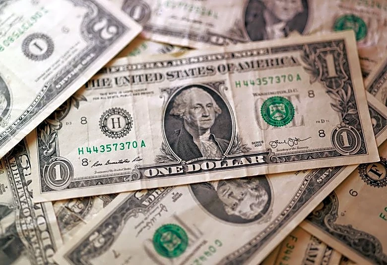 Dollar trading near multi-month lows, restrained by debt nerves