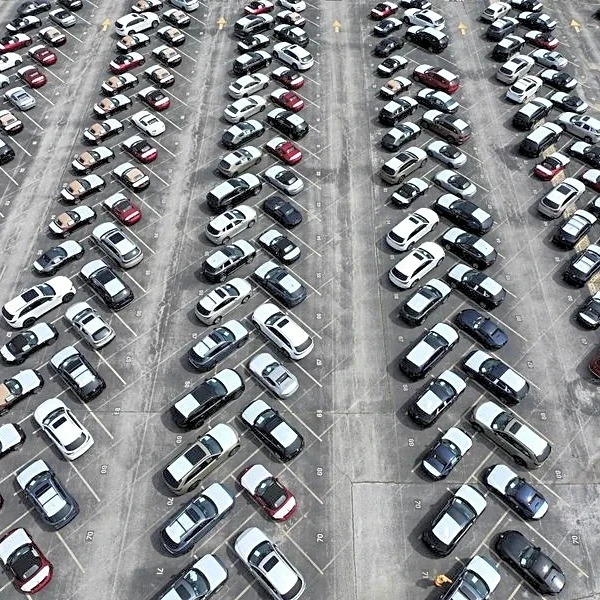 Trump threatens 50% tariffs on all cars and trucks amid Canada trade spat