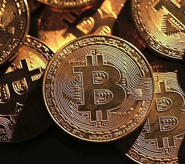 Bitcoin rises above $80,000 as soft dollar, debasement fears boost momentum