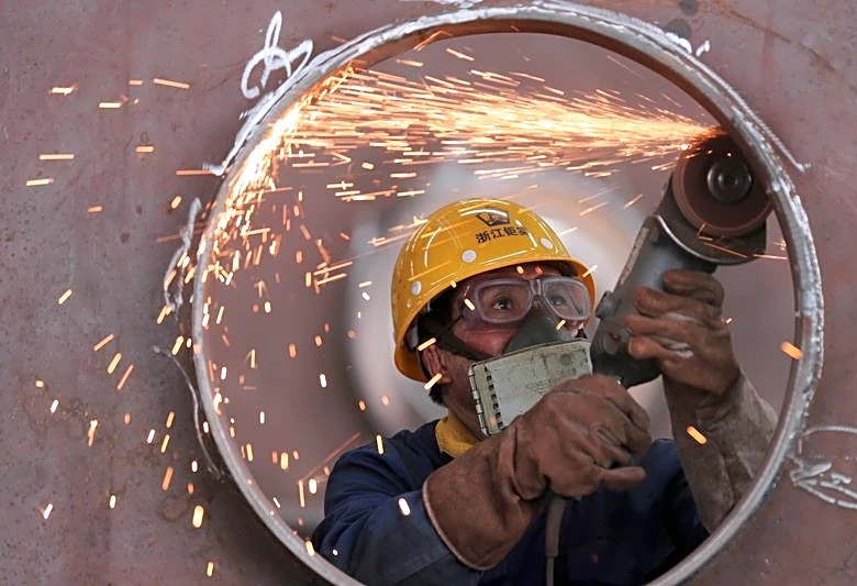 China's industrial profit growth cools as AI-linked sectors outpace