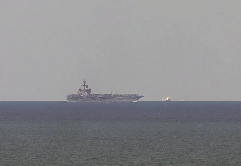 After over 200 days at sea, U.S. aircraft carrier arrives in Thailand