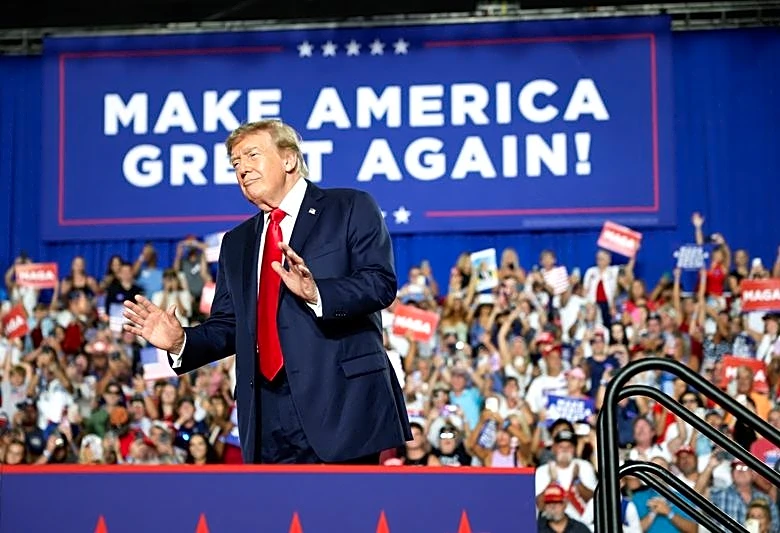 Trump vows to hit campaign trail hard for Republicans in tight midterms