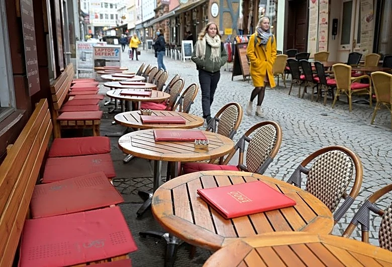 German services sector downturn eases in August on stronger demand, hiring