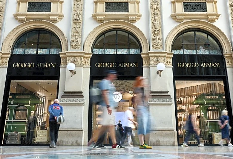 One year after its founder's death, Armani faces challenge of 'inevitable evolution'