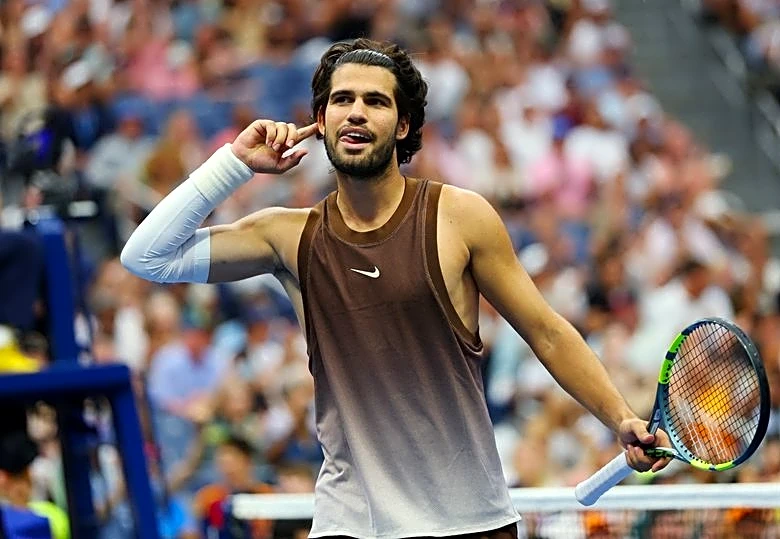 Tennis-Alcaraz tones down the tank top after revealing too much