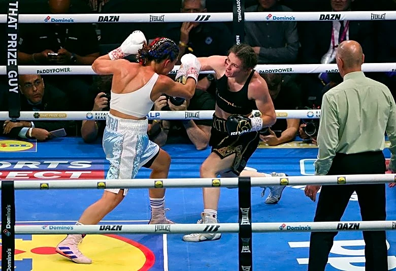 Boxing-Taylor beats Pili by unanimous decision to bow out as undisputed champion