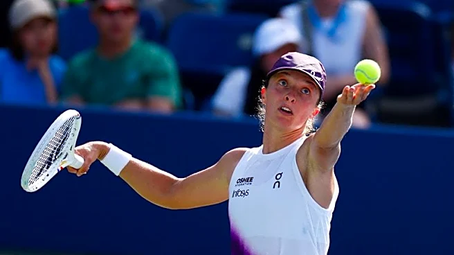 Tennis-Swiatek happy to swap noisy Ashe spotlight for intimate Grandstand