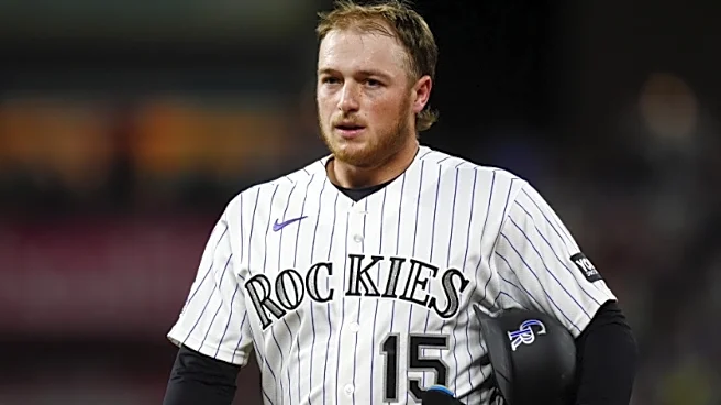 Rockies C Hunter Goodman denies complaining about tilted cap