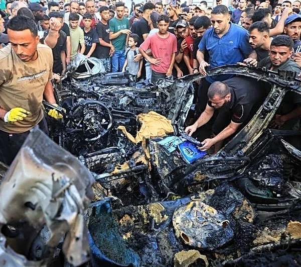 Israeli strike kills a man and his daughter in Gaza, medics say