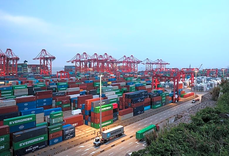 China's exports expand faster in August, underpin economic growth