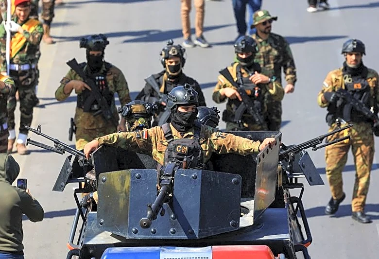 Explainer-Why is US ally Iraq unable to disarm Iran's militia allies?