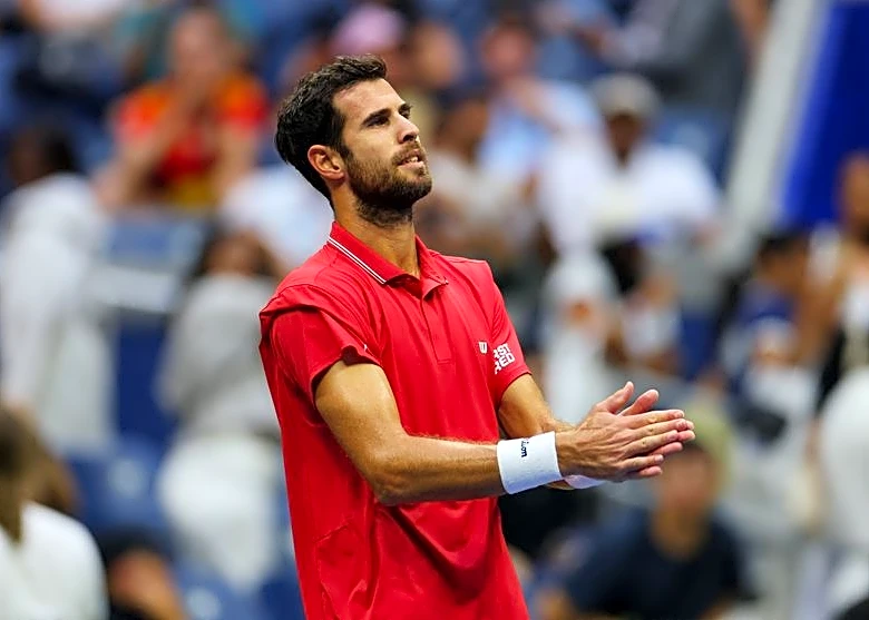 Tennis-Khachanov back to US Open semi-finals as Blockx retires