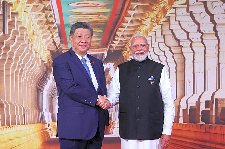 India's Modi and China's Xi push business links, border peace as ties revive