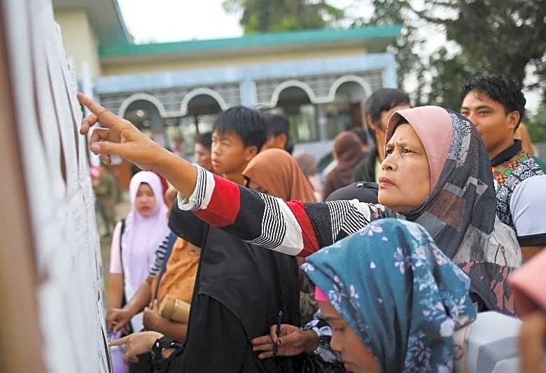 Voting starts in Philippines' south after three killed in election violence