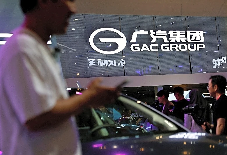 China's GAC plans to buy FAW stake in an auto JV, filing shows