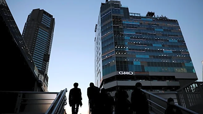 Japan to sidestep funding in tax cut outline, keep fiscal concern alive
