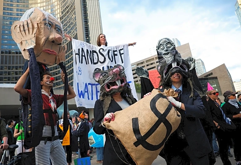 Hundreds march in Toronto against Carney's investment summit