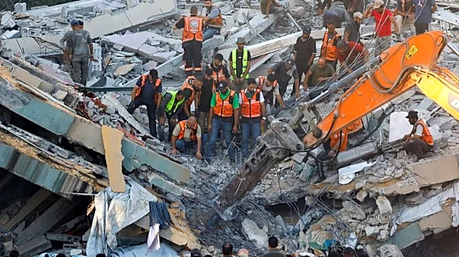 War-damaged Gaza building collapses, killing 20 people sheltering inside